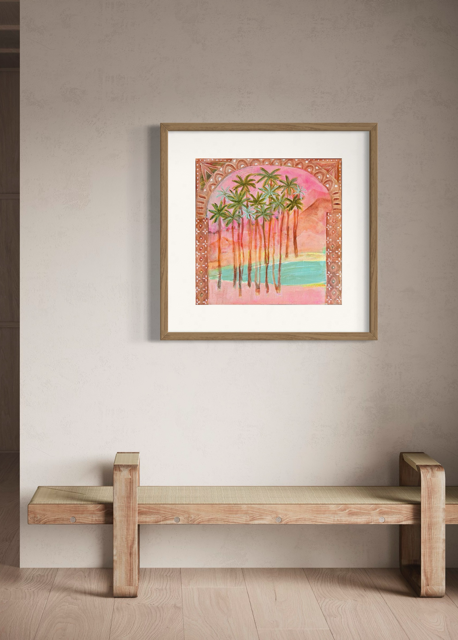 Framed artwork of palm trees on a wall above a wooden bench.