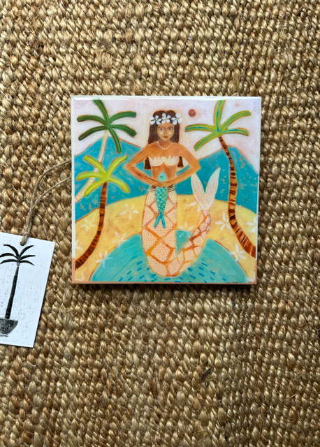 Decorative tile with a mermaid design on a textured surface plenty more fish by sue fantini