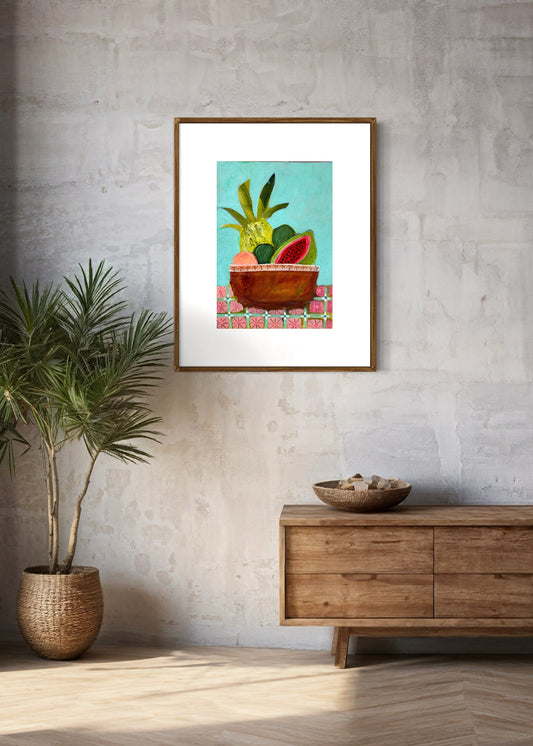 Tropical bowl of fruit art print framed and hanging in living room
