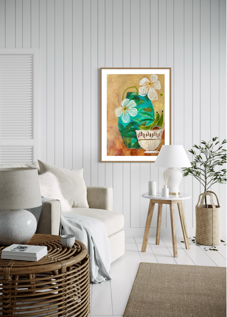 Living room with a white wall, floral artwork, and decorative items.