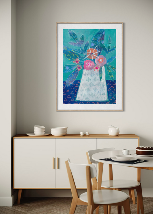 Dining room with a colorful abstract painting on the wall above a wooden sideboard.